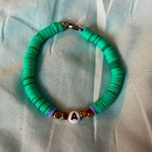 Really cute teal blue -A- bracelet